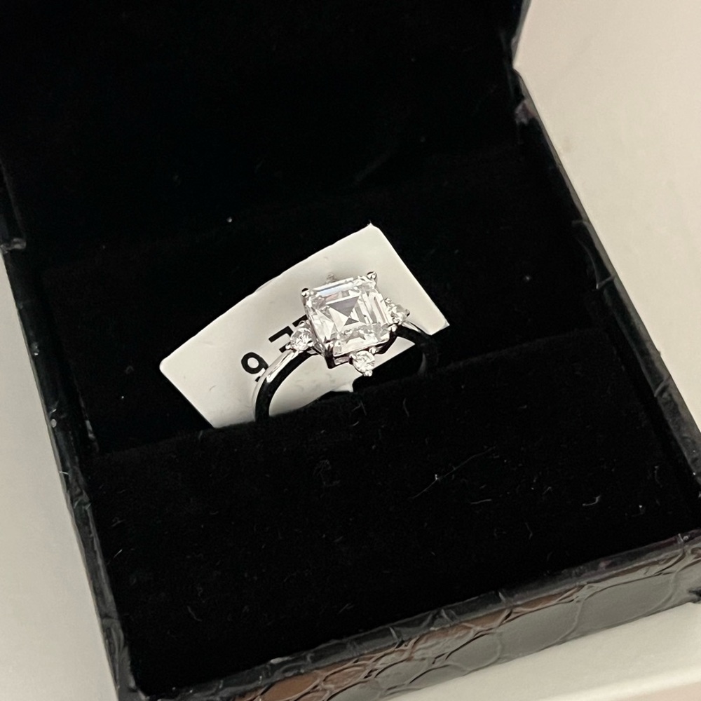 Charmed Aroma Elegant Silver Ring with Clear Gemstone